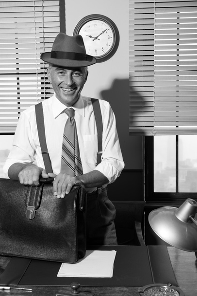 Smiling businessman arriving at office - Fotó, kép