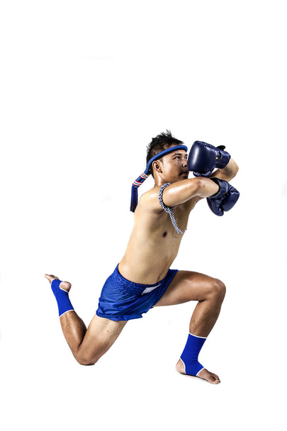 Thai boxer with thai boxing action - Photo, Image