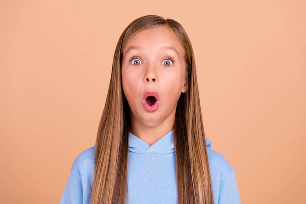 Photo of shocked confused person open mouth stare speechless cant believe isolated on beige color background. - Photo, image