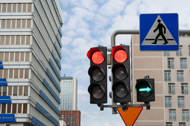 Traffic lights and Pedestrian Crossing road sign in city - Photo, image