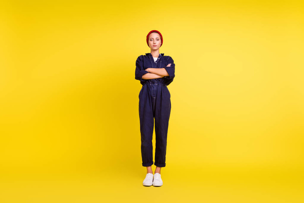 Full length body size view of attractive serious content girl folded arms isolated over bright yellow color background. - Photo, Image