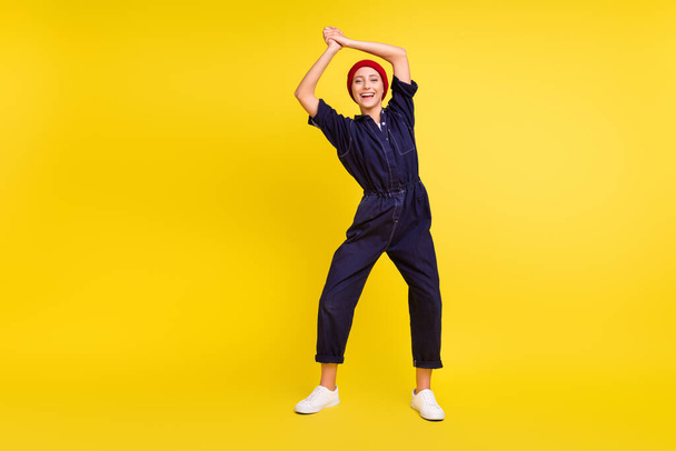Full length body size view of attractive cheerful lucky girl rejoicing yes goal isolated over bright yellow color background. - Fotografie, Obrázek