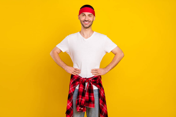 Photo portrait man in headband smiling in casual clothes isolated vivid yellow color background. - Foto, Bild
