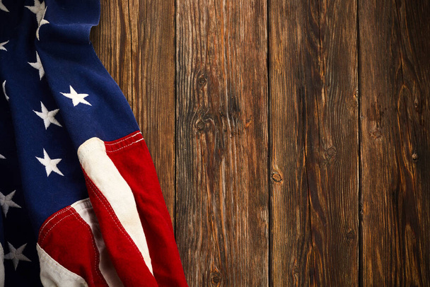 American flag for Memorial Day or 4th of July. American Flag On Dark Wooden Background. - 写真・画像