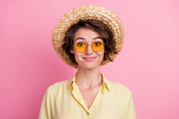 Photo of young attractive girl happy positive smile travel summer sunhat glasses isolated over pink color background. - Fotó, kép