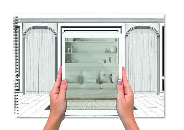 Kädet tilalla tabletti osoittaa klassinen olohuone, kannettava pohjapiirros tausta, täydennetty todellisuus käsite, sovellus simuloida huonekaluja ja sisustustuotteita - Valokuva, kuva