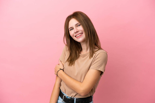 Young English woman isolated on pink background laughing - Foto, Imagen