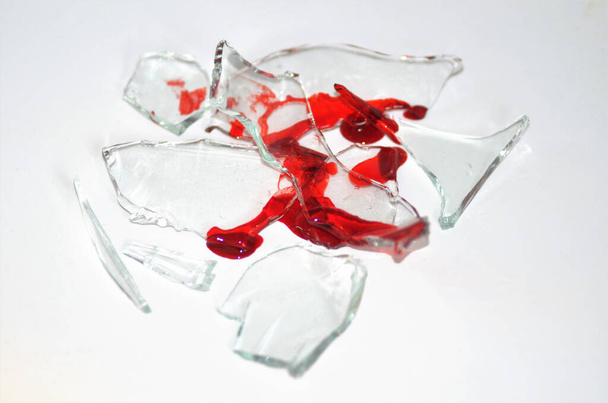 red liquid in a glass jar on a white background - Zdjęcie, obraz
