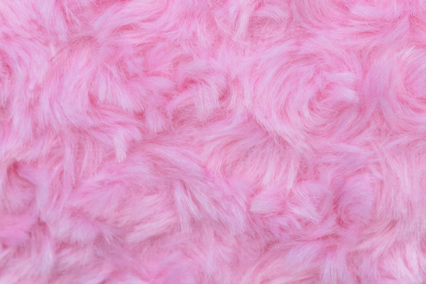Ροζ μαλλί πολυτελείας φυσικό αφράτο γούνα μαλλί υφή του δέρματος close-up χρήση για φόντο και ταπετσαρία - Φωτογραφία, εικόνα