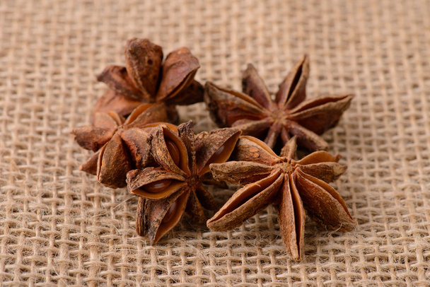 star anise flowers on sacking - Photo, Image