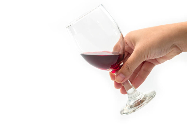 Holding a glass of red wine separately on a white background - Photo, Image