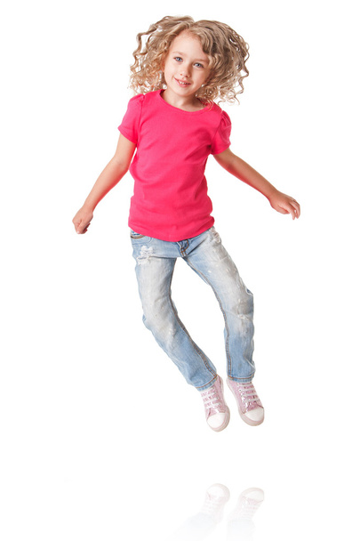 Happy jumping girl with heels together - Fotoğraf, Görsel