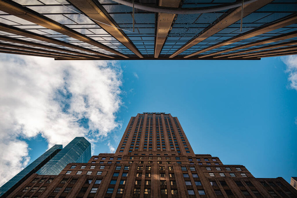 Looking directly up at the skyline of the financial district in Manhattan NYC. High-quality photo - Zdjęcie, obraz