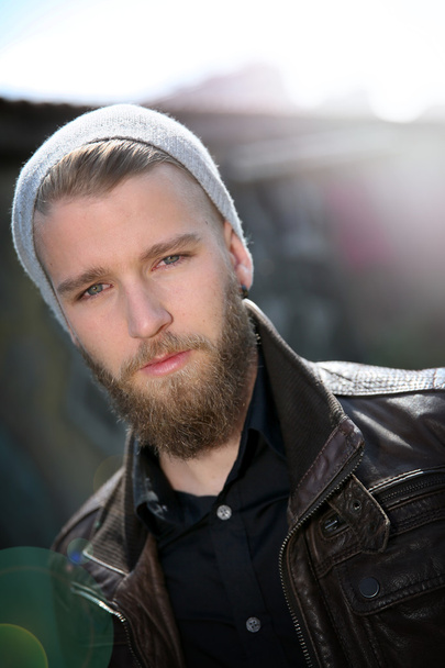 Stylish guy with beard in street - Valokuva, kuva