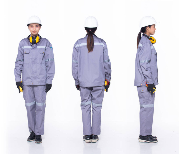 Full length 30s Ασιάτισσα μηχανικός ηλεκτρολόγος μηχανικός, 360 μπροστινή πλευρά πίσω, φορούν στολή εργαλείων ασφαλείας. Μαύρο μαλλί Εργοστάσιο θηλυκό αισθάνονται ευτυχείς χαμόγελο ευεξία πάνω από λευκό φόντο απομονωμένο - Φωτογραφία, εικόνα