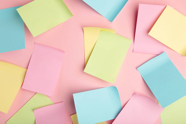 Colorful sticky notes on pink background. Top view - Foto, Imagem