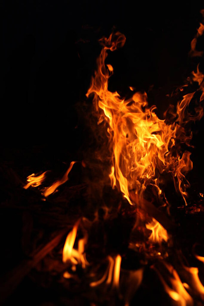 Fire flame isolated on black background - Фото, зображення