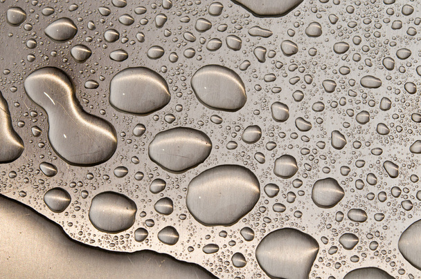 kapky vody na leštěný kov - Fotografie, Obrázek