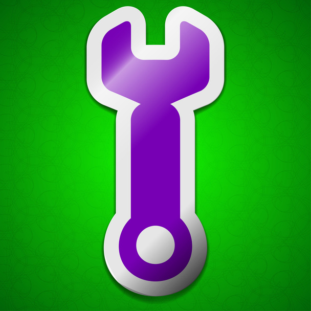 Klucz ikona klucza znak. Symbol szykowny kolorowe etykiecie Przyklejony na zielonym tle. - Zdjęcie, obraz