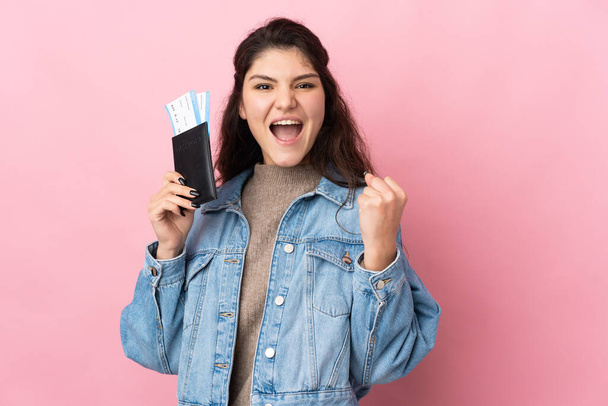 beautiful young woman holding passport on color background  - 写真・画像