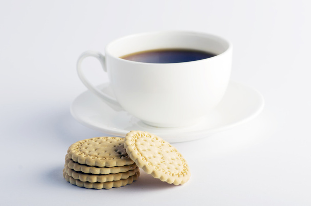 Чашка чаю з печивом
  - Фото, зображення