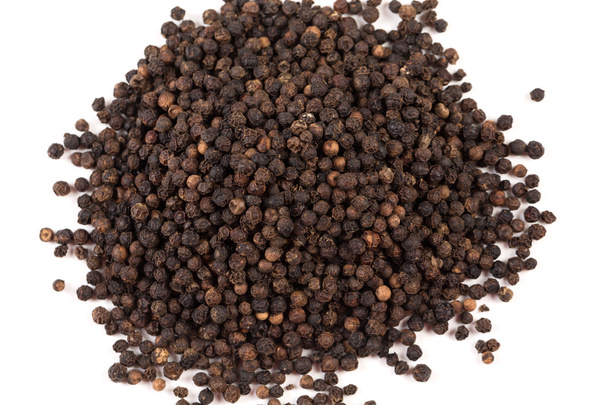 Black pepper was placed on a white background - Foto, Bild