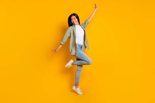 Full size photo of overjoyed satisfied lady toothy smile enjoy free time isolated on yellow color background. - Foto, Imagem