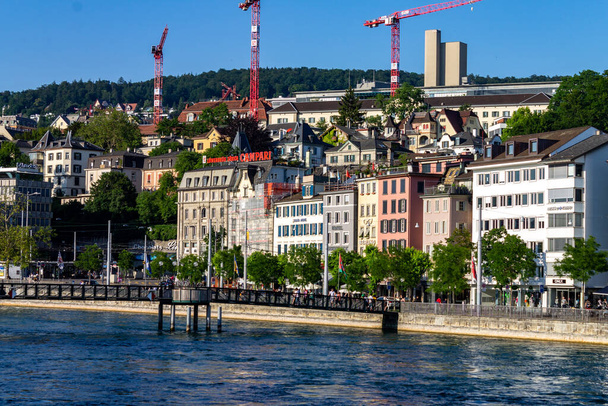 A beautiful view of buildings on the coastline of Limmat river, Zurich - Photo, Image