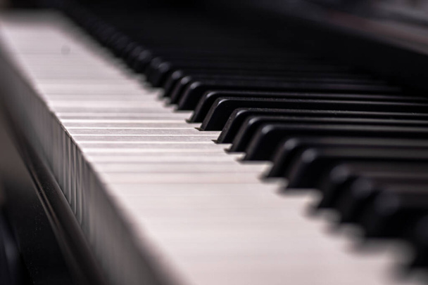 A closeup shot of the piano keyboards - Photo, image
