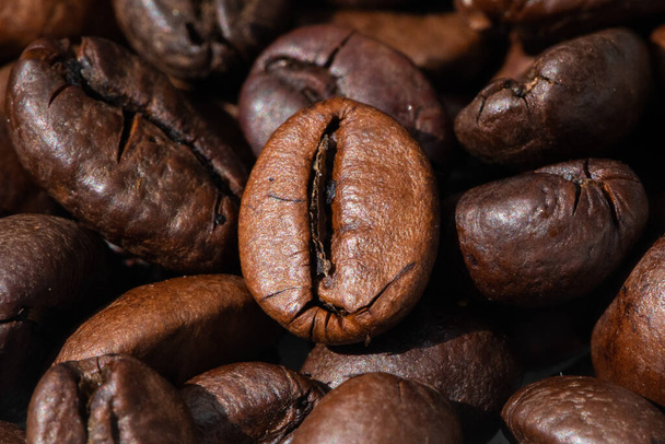roasted and brown coffee beans background - Photo, Image