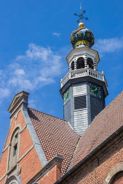 Crown on top of the historic new church of Emden, Germany - 写真・画像