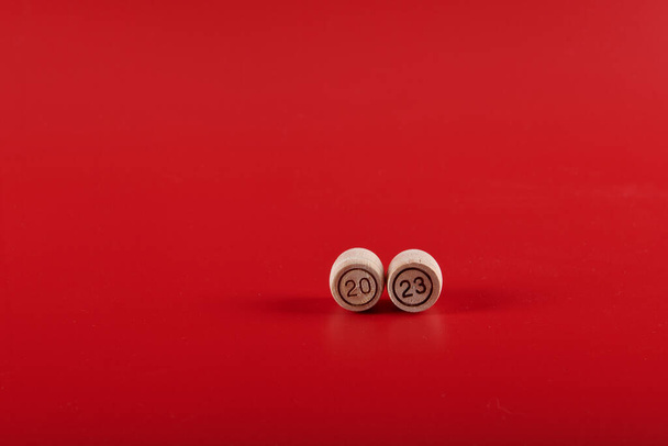 numbers 2023 lie on a red background. High quality photo - Foto, Imagem