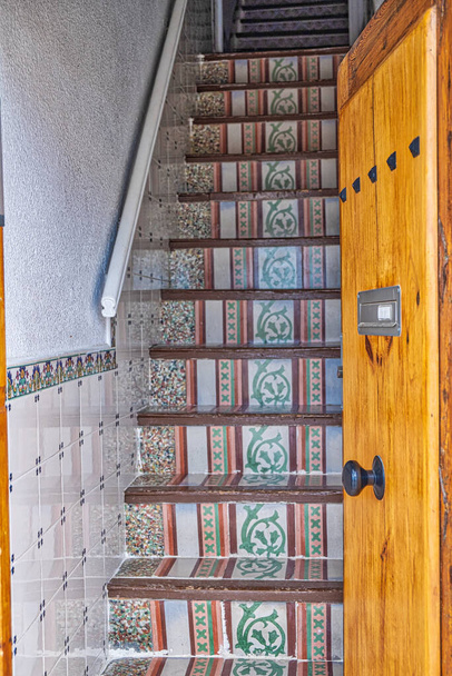 A vertical shot of traditional Moroccan stairs decorated with tiles - Fotó, kép