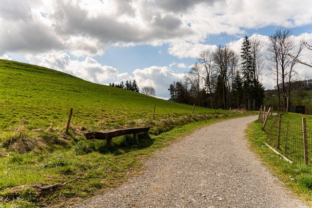 The empty rural road against the blue sky. Beromunster, Switzerland. - Fotoğraf, Görsel