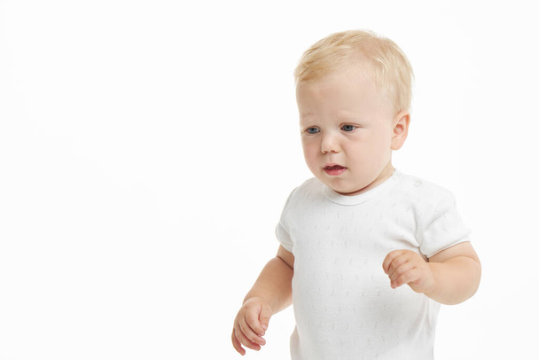 Portrait of cute baby boy on white background. Copy space - Φωτογραφία, εικόνα