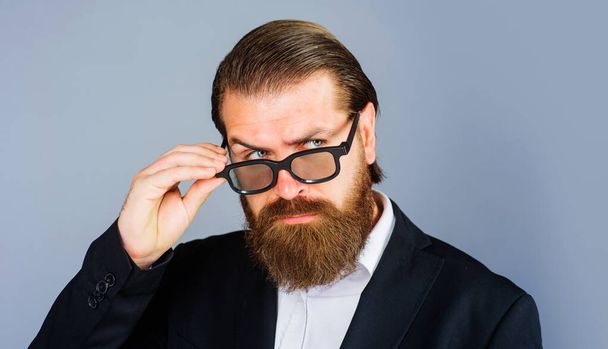 Handsome businessman in spectacles. Elegant bearded man in glasses and suit. Male beauty, fashion - Φωτογραφία, εικόνα