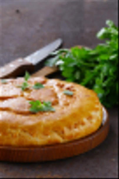 Домашній м'ясний пиріг з картоплею та орегано
 - Фото, зображення