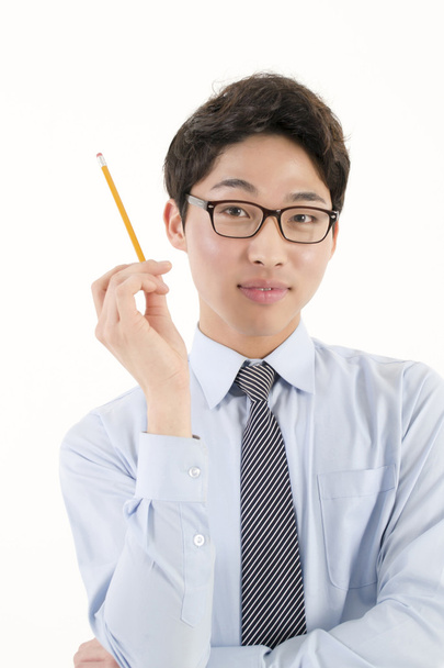 Asiatique mâle étudiant avec un crayon
 - Photo, image