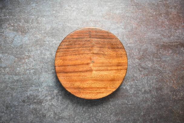 Brown wooden round rolling board - Photo, Image