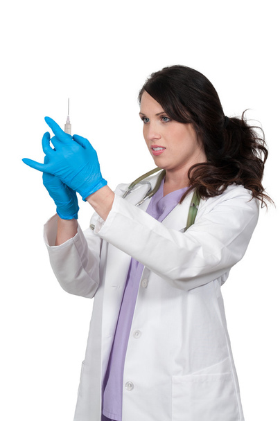 Female Doctor with Syringe - Foto, afbeelding