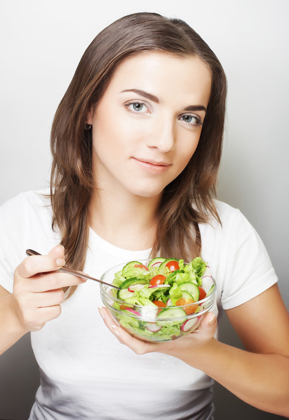 lány a saláta fehér alapon - Fotó, kép