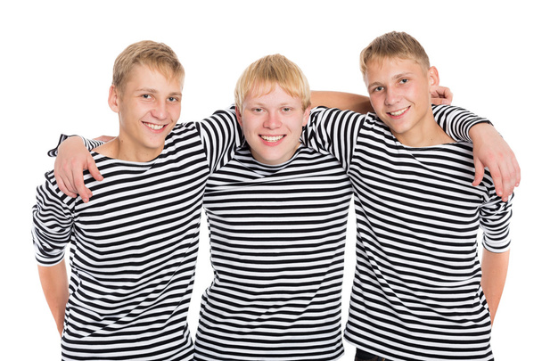 Smiling boys in striped shirt isolated on white  - Fotografie, Obrázek