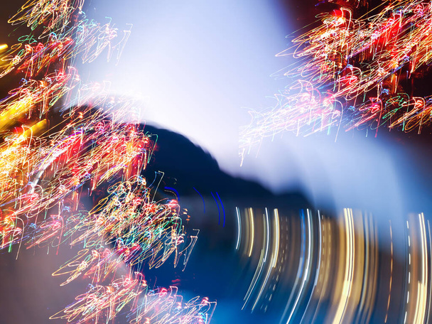 Light painting effects. Blurred lights trails making  pattern on  background. - Photo, Image