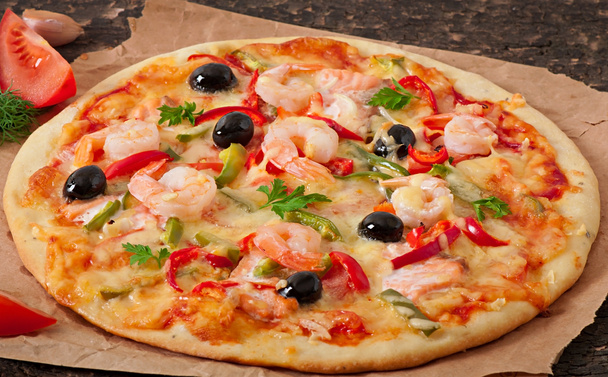 Pizza with shrimps and salmon - Photo, Image