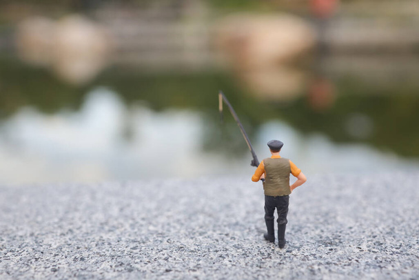 the fun of mini figure is fishing  - Photo, Image