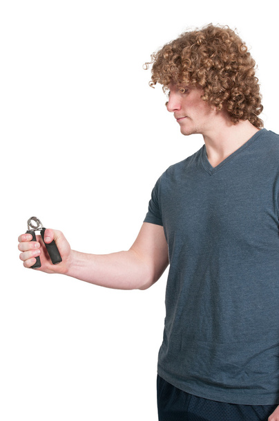 Man with hand grip exerciser - Photo, Image
