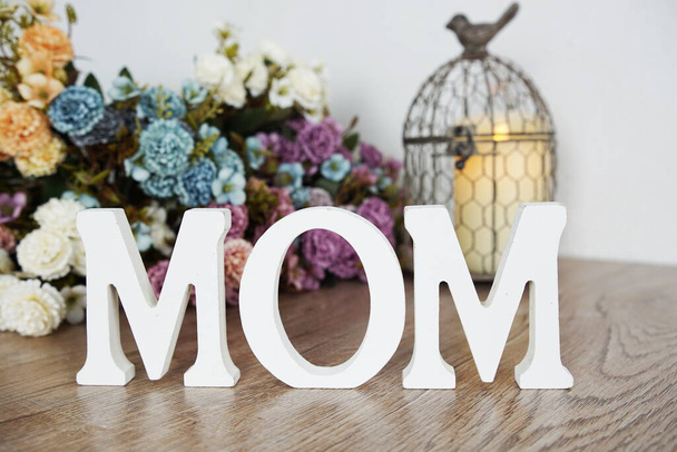 Happy Mothers day with MOM word with flower bouquet decoration - Foto, Imagem