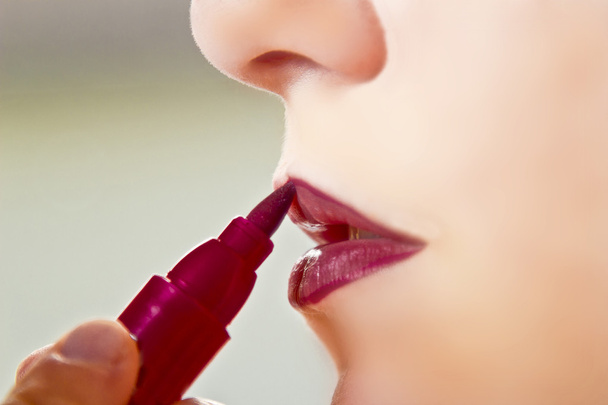 Lip make-up lippenstift - Foto, afbeelding