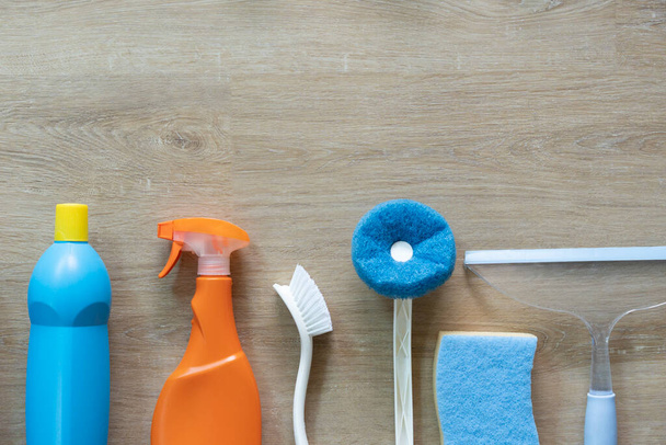 House cleaning plastic product on wood table background, home service or housekeeping concept - Photo, Image