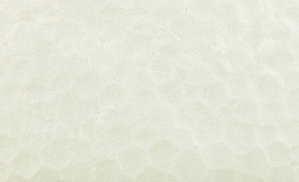 A background of an old crumpled paper background in light green - Foto, immagini